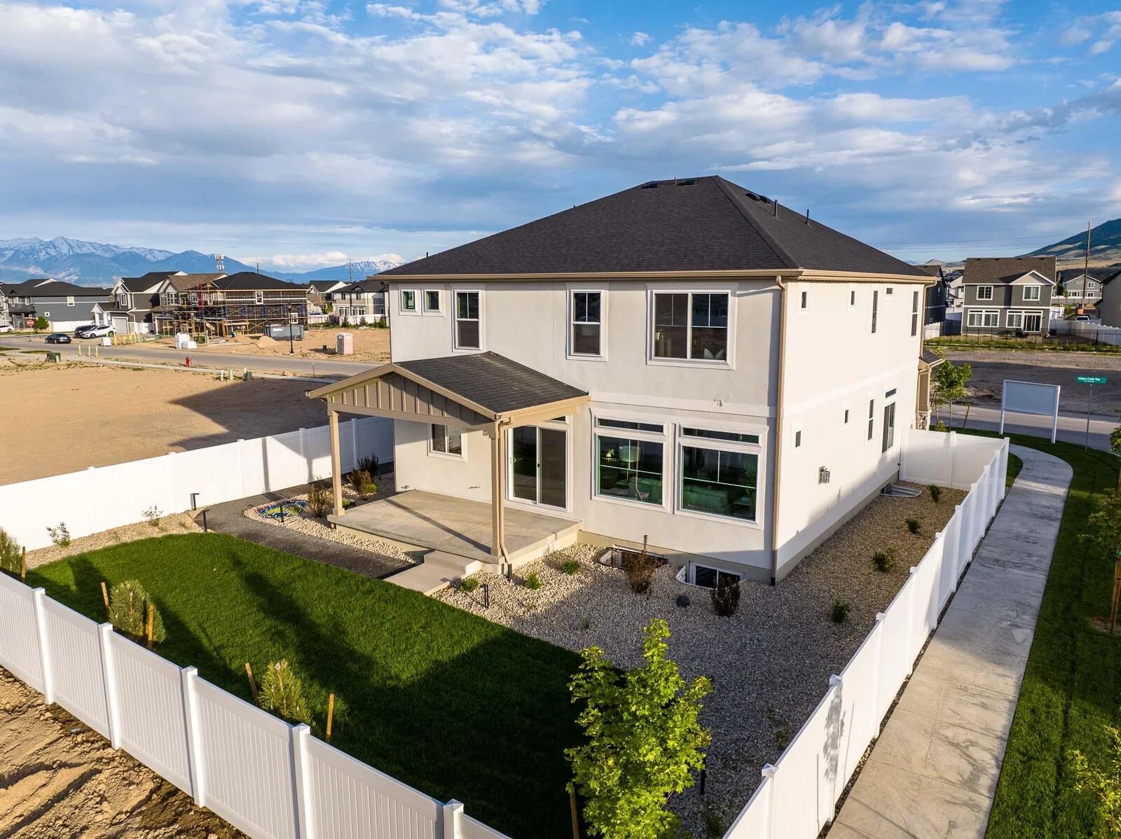 Aerial view of a privacy-fenced backyard